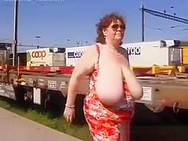 Mature Woman Shows Off Her Tits Outside