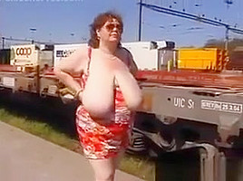 Mature Woman Shows Off Her Tits Outside