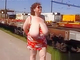 Mature Woman Shows Off Her Tits Outside