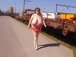 Mature Woman Shows Off Her Tits Outside