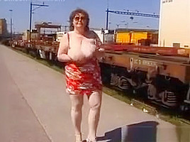 Mature Woman Shows Off Her Tits Outside
