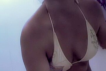 Mature fixes white bikini on the big boobs