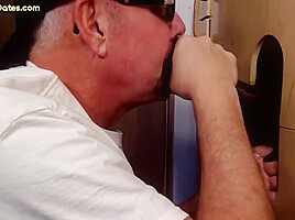 Mature gloryhole amateur DILF sucks and wanks black cock
