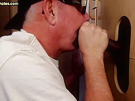 Mature gloryhole amateur DILF sucks and wanks black cock