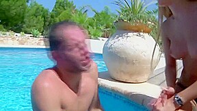 Mistress with slave at the pool