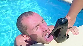 Mistress with slave at the pool