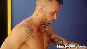 Muscular inked hunk buttfucks strong jock