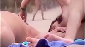 Nude beach - lesbian fingering kissing nipple play