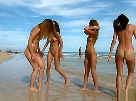 Nude women on the shore of the beach