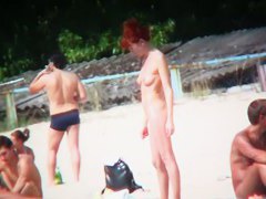 Nudist beach shoots naked babes sunbathing