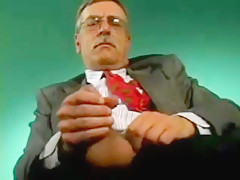 Old man with mustache and glasses masturbates
