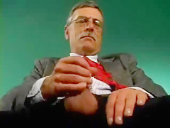 Old man with mustache and glasses masturbates