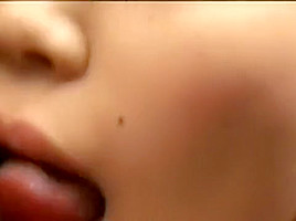 Petite Asian doll in pigtails gets her first taste of a black cock