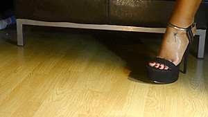 Putting onHigh Stiletto Platform Sandals