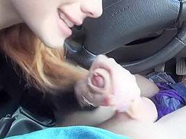 Redhead slut fucks dude with car