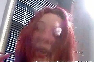 Redhead slut smoking while posing sexy on cams