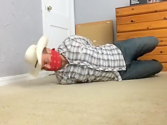 Roped up and Bandana Gagged