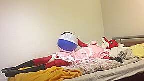 Rubber fox maid plays with beach ball