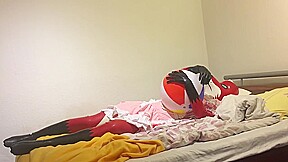 Rubber fox maid plays with beach ball