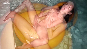 She rubs her pussy in the swimming pool