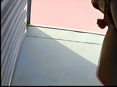 Slender girl stays in change room in erotic bikini