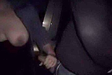 Some broad swinger blowing strangers in parking lot
