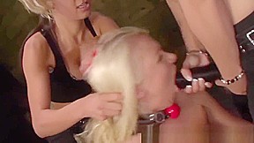 Strapon slave dominated by mistresses in threeway