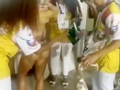 Stylists dress up a smoking hot babe from Brazil for the Carnival