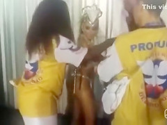 Stylists dress up a smoking hot babe from Brazil for the Carnival