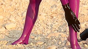 Susan Wayland in purple Latex