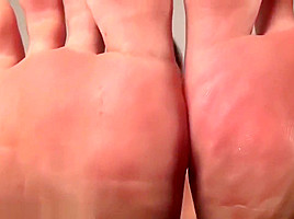 Teased by Asian girl showing off her big feet