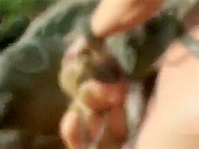 Two bitches in bondage blow their stiff master and gets fucked outdoors
