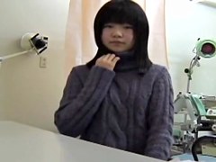 Young Japanese girl reaches an orgasm at her gyno s office