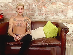 Young jock Mickey Taylor shows off tattoos before wanking
