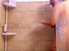 busty in shower shaving