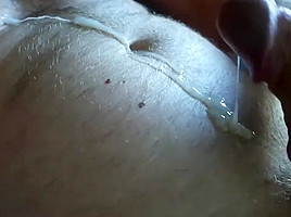 guy jerking off a huge dick and pouring himself with sperm