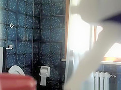 teen 18+ pees and checks herself in mirror
