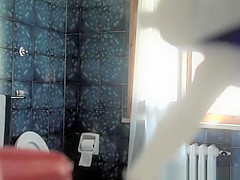 teen 18+ pees and checks herself in mirror